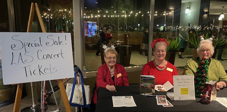 season tickets sellers at the Guild table in the Bankhead at the December 2023 LAS concert