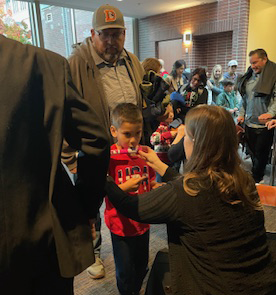 trying out the flute in the Bankhead lobby after the free family concert 12/6/25
